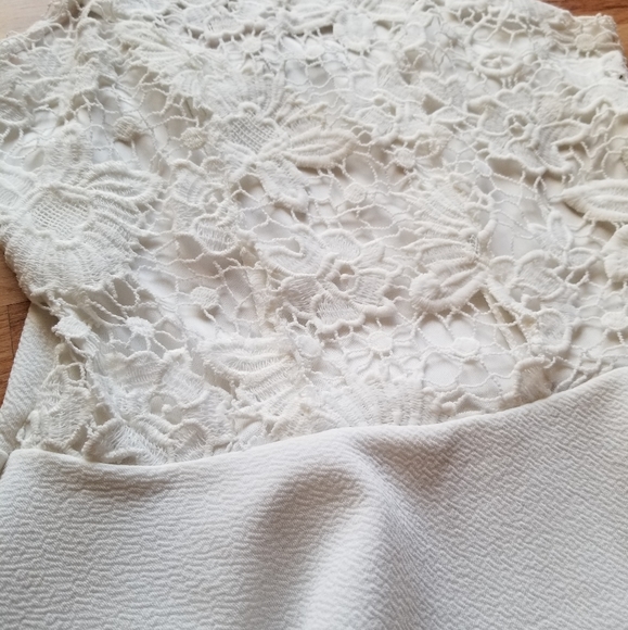 High-Neck Peplum Top - Picture 2 of 5